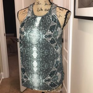 Green “snake” type print shirt by Tart. XS